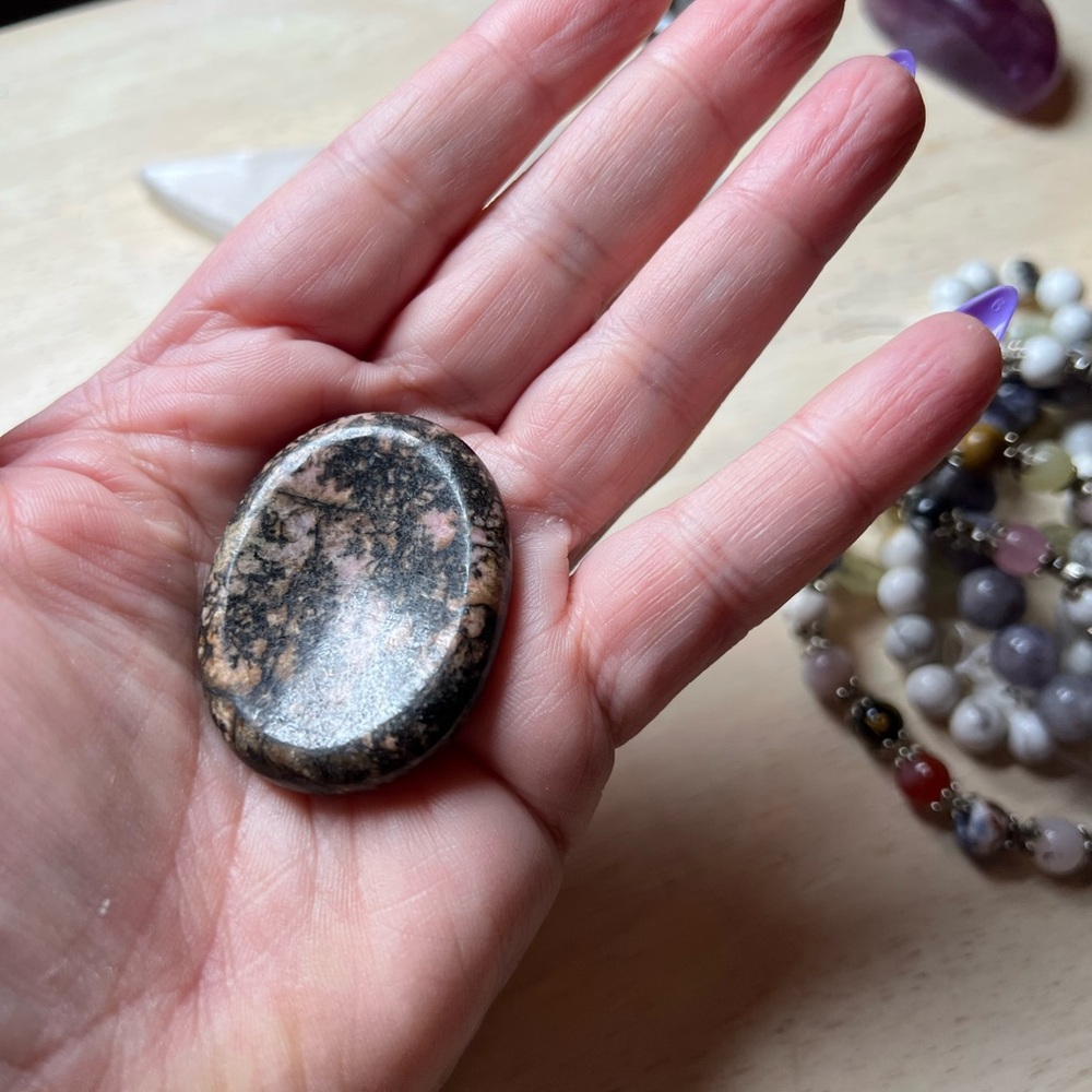 #52 Elegant Black and Pink Crystal Rhodonite Worry Stone